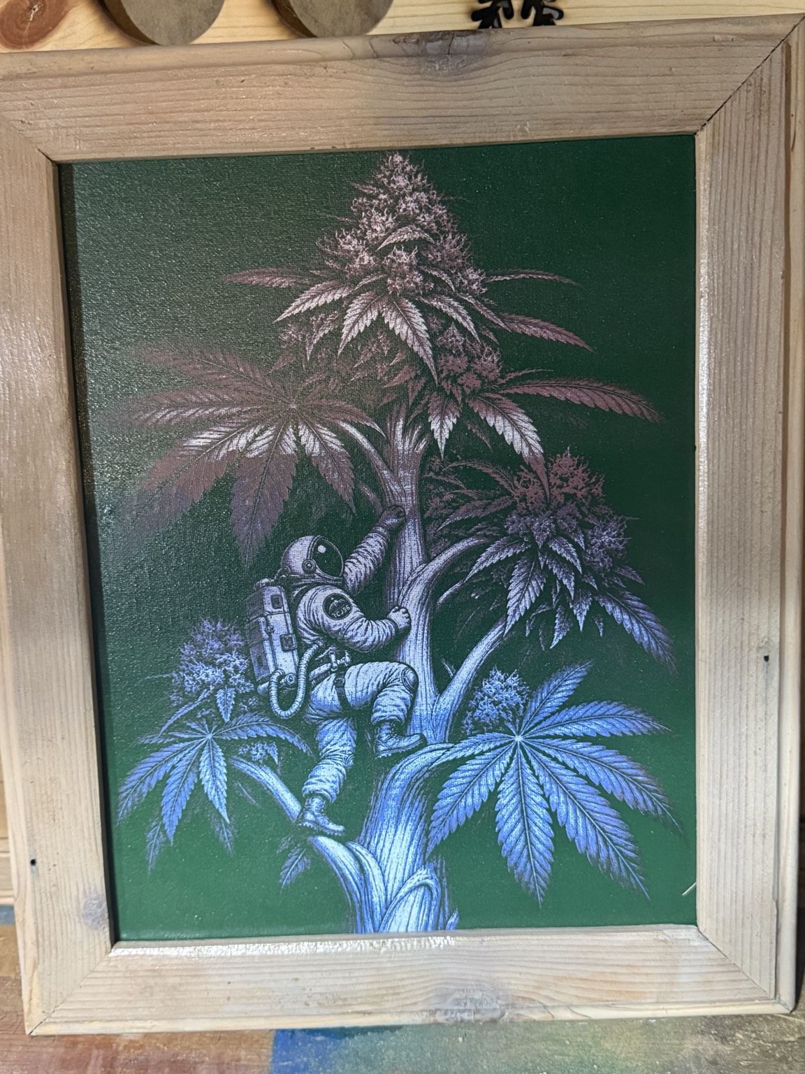 Higher Than Orbit — Astronaut cannabis plant wall art — original laser-engraved painting